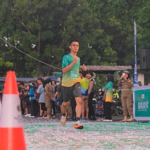 Race photo from BAUR RUN 2025