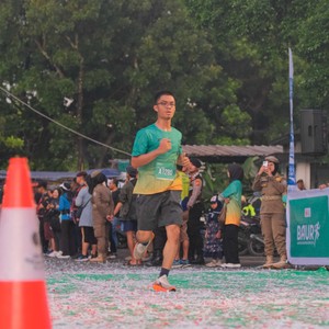 Race photo from BAUR RUN 2025