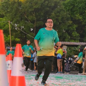 Race photo from BAUR RUN 2025