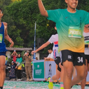Race photo from BAUR RUN 2025