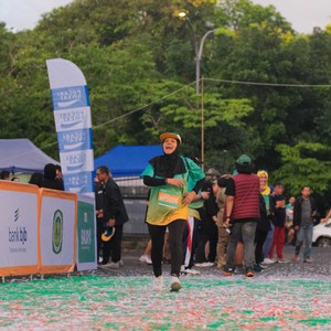 Race photo from BAUR RUN 2025