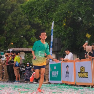Race photo from BAUR RUN 2025