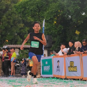 Race photo from BAUR RUN 2025