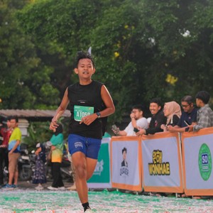 Race photo from BAUR RUN 2025