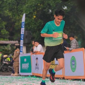 Race photo from BAUR RUN 2025