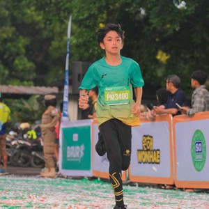 Race photo from BAUR RUN 2025