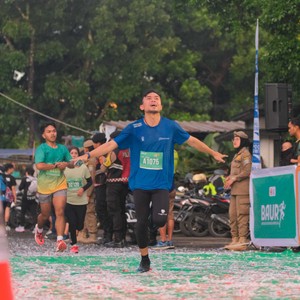Race photo from BAUR RUN 2025