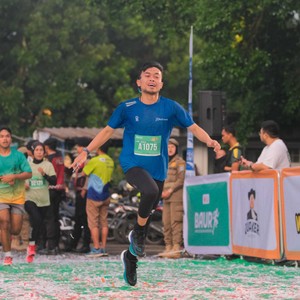 Race photo from BAUR RUN 2025