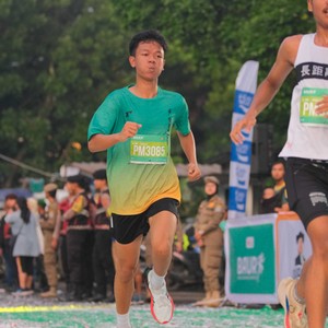 Race photo from BAUR RUN 2025