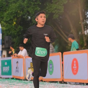 Race photo from BAUR RUN 2025