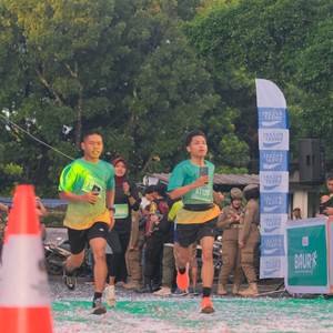 Race photo from BAUR RUN 2025