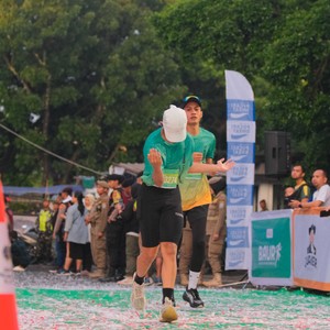 Race photo from BAUR RUN 2025