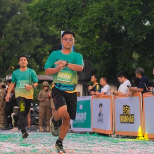 Race photo from BAUR RUN 2025