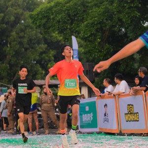 Race photo from BAUR RUN 2025