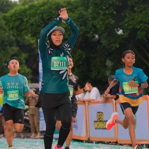 Race photo from BAUR RUN 2025
