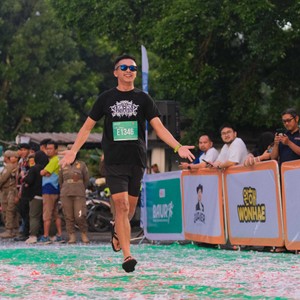 Race photo from BAUR RUN 2025