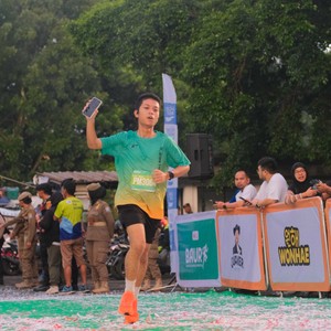 Race photo from BAUR RUN 2025