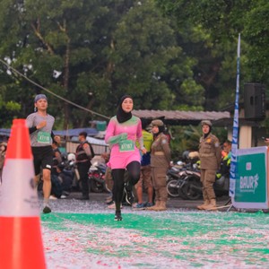 Race photo from BAUR RUN 2025