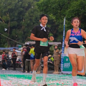 Race photo from BAUR RUN 2025