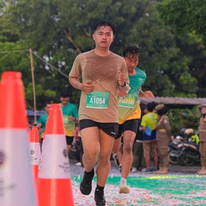 Race photo from BAUR RUN 2025