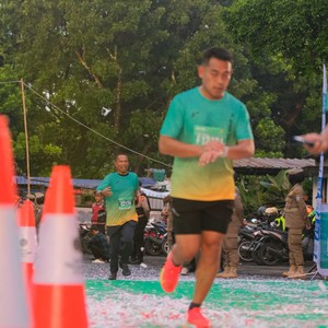 Race photo from BAUR RUN 2025