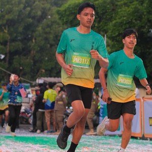 Race photo from BAUR RUN 2025