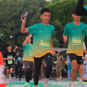 Race photo from BAUR RUN 2025