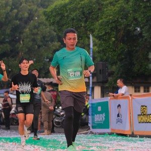 Race photo from BAUR RUN 2025