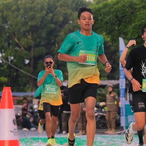 Race photo from BAUR RUN 2025