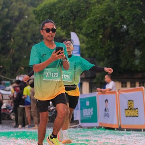 Race photo from BAUR RUN 2025