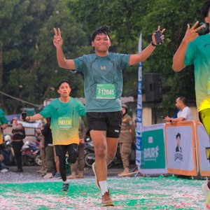 Race photo from BAUR RUN 2025