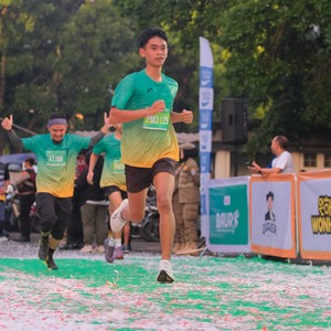 Race photo from BAUR RUN 2025