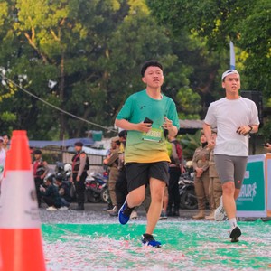 Race photo from BAUR RUN 2025