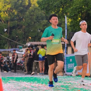 Race photo from BAUR RUN 2025