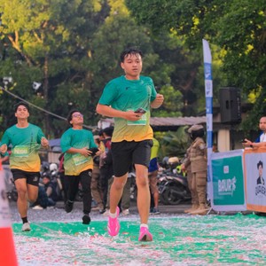 Race photo from BAUR RUN 2025