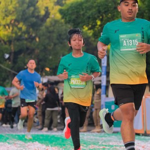 Race photo from BAUR RUN 2025