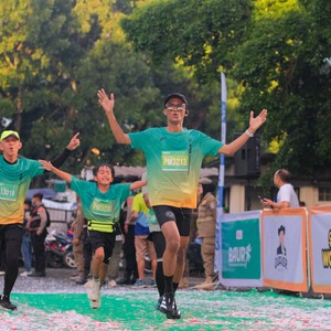Race photo from BAUR RUN 2025