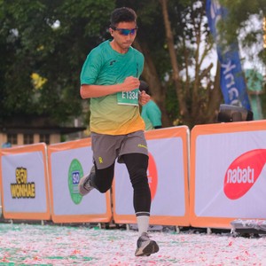 Race photo from BAUR RUN 2025