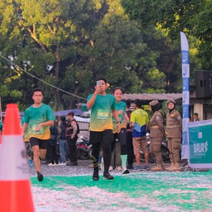 Race photo from BAUR RUN 2025