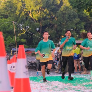 Race photo from BAUR RUN 2025