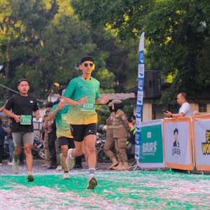 Race photo from BAUR RUN 2025