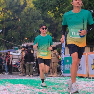 Race photo from BAUR RUN 2025