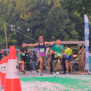 Race photo from BAUR RUN 2025