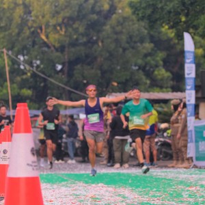 Race photo from BAUR RUN 2025