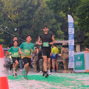 Race photo from BAUR RUN 2025