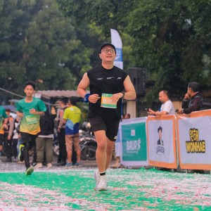 Race photo from BAUR RUN 2025