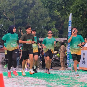 Race photo from BAUR RUN 2025
