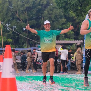 Race photo from BAUR RUN 2025