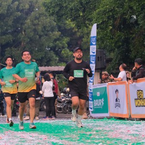 Race photo from BAUR RUN 2025