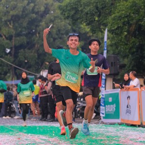 Race photo from BAUR RUN 2025